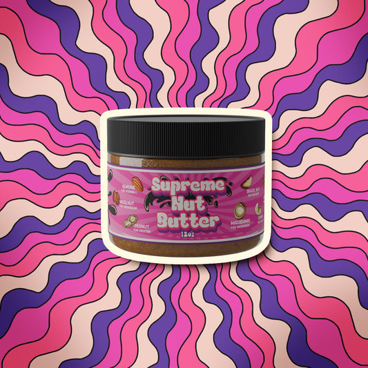 Better Than Honey Supreme Nut Butter jar with purple wave background – blend of nine nuts and molasses for protein and minerals.